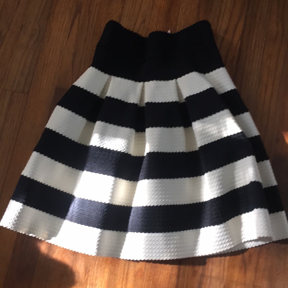 pleated black and white striped high waisted skirt